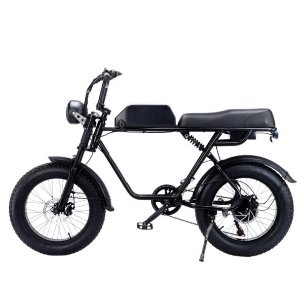 "Frike F4 sähköpyörä pysäköitynä modernin toimistorakennuksen eteen kirkkaassa auringonvalossa."